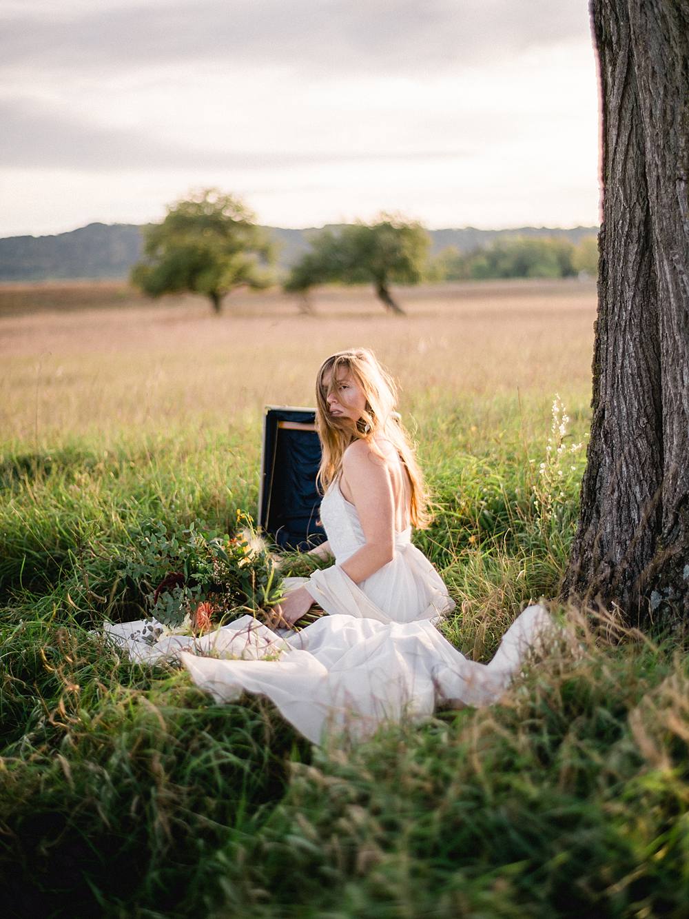 northern michigan bride in a field photographed by michigan wedding photographer brian d smith photography on kodak film